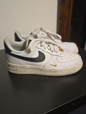 Nike Low-Top Sneakers in White, Black & Gold Detail